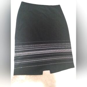 The limited woman's size 2 black gray and silver pencil skirt